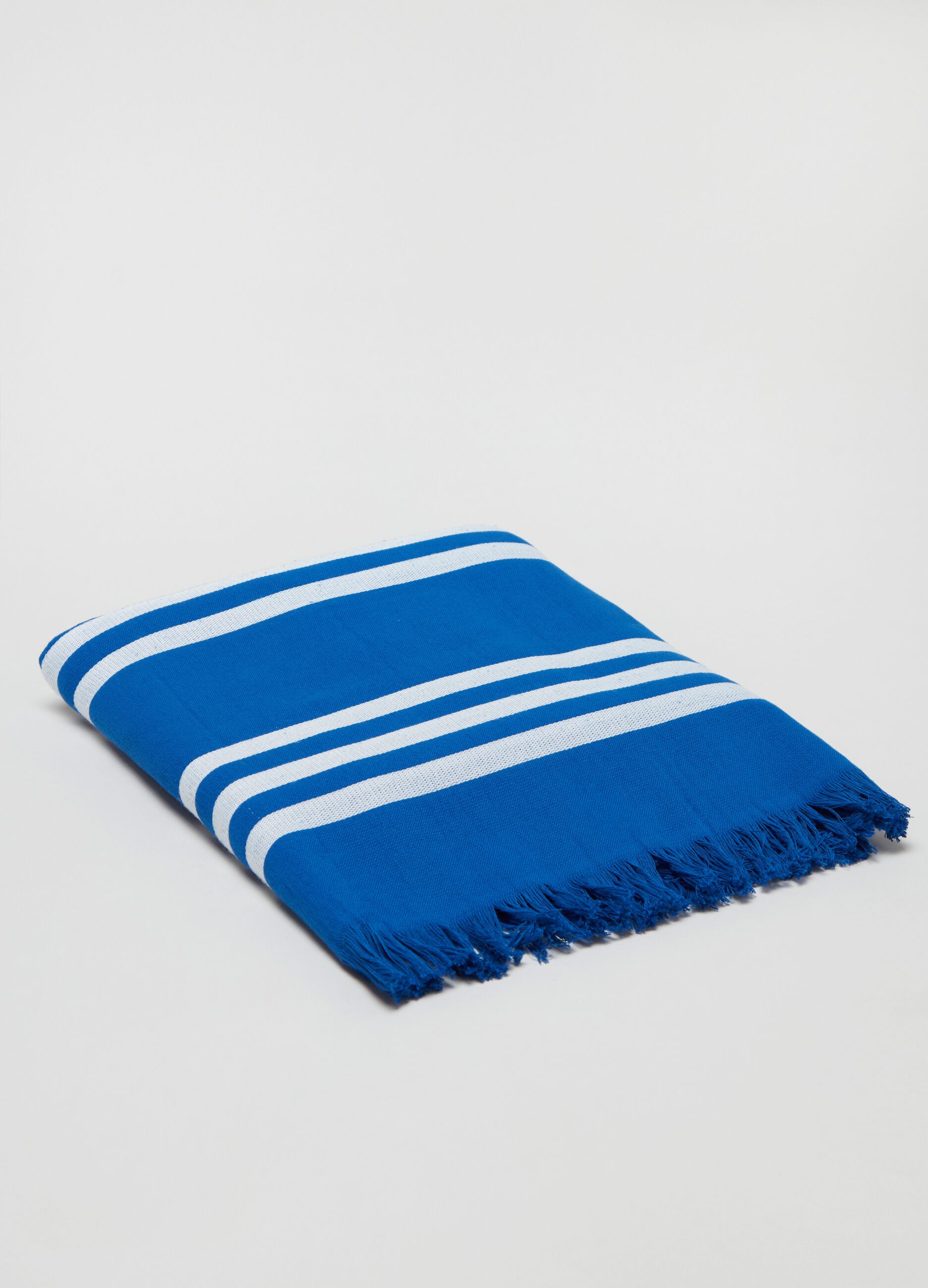 Beach towel with striped pattern.