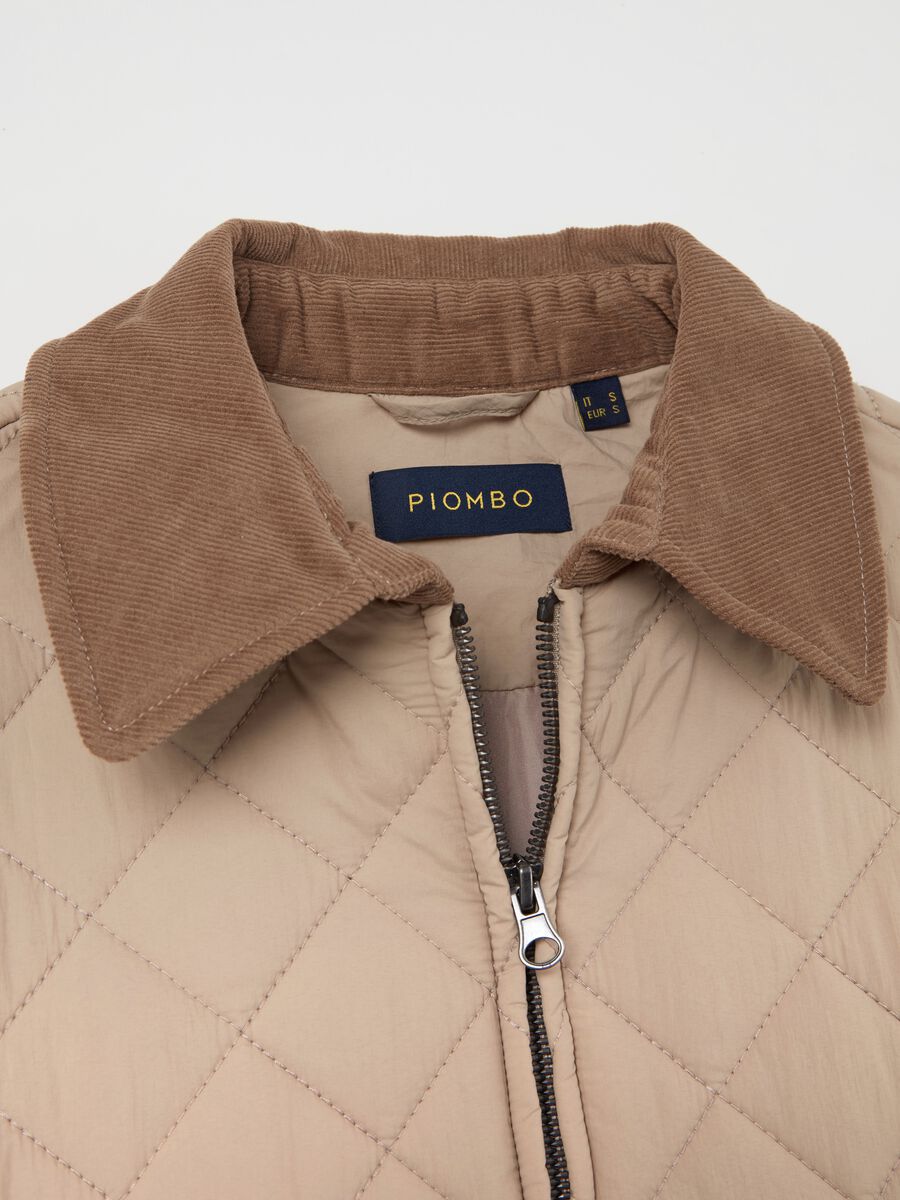 Short quilted jacket with collar in corduroy_5