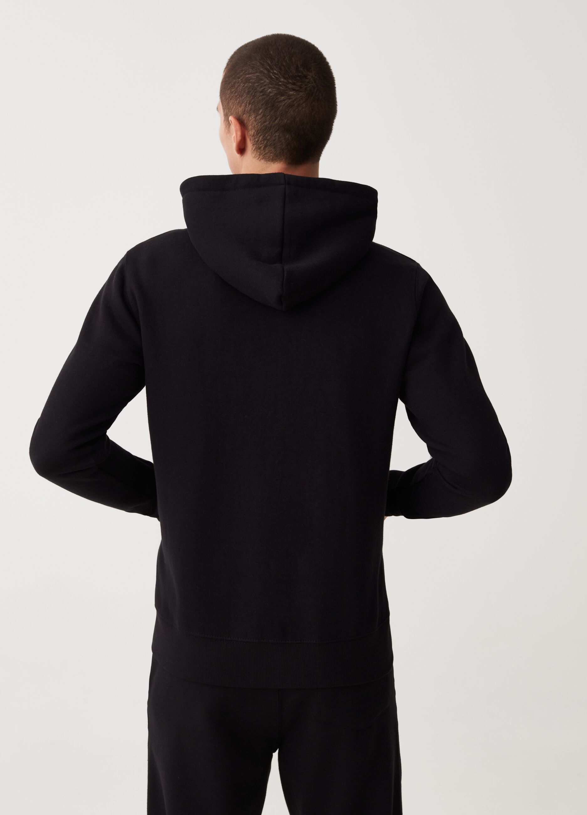 Hooded sweatshirt with zip closure