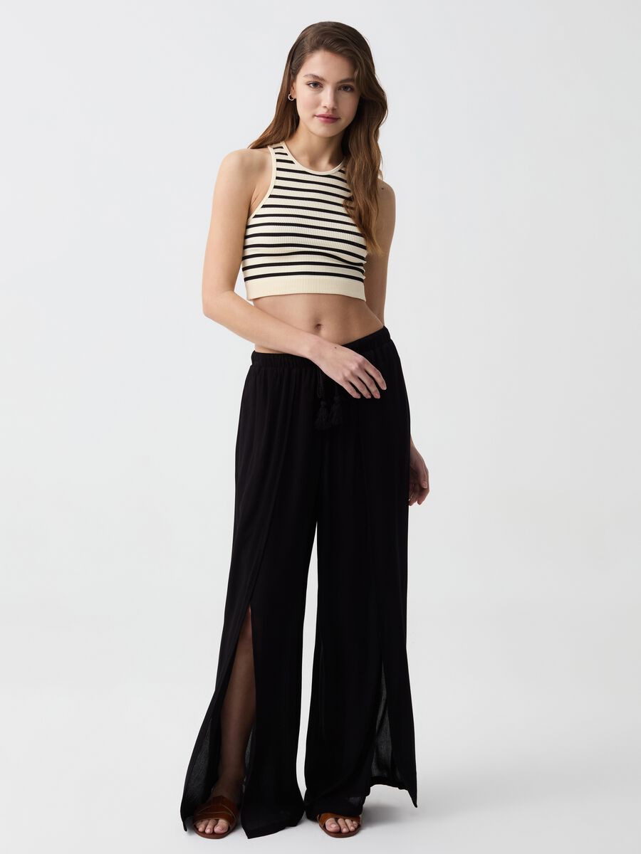 Wide-leg palazzo trousers with slits_0