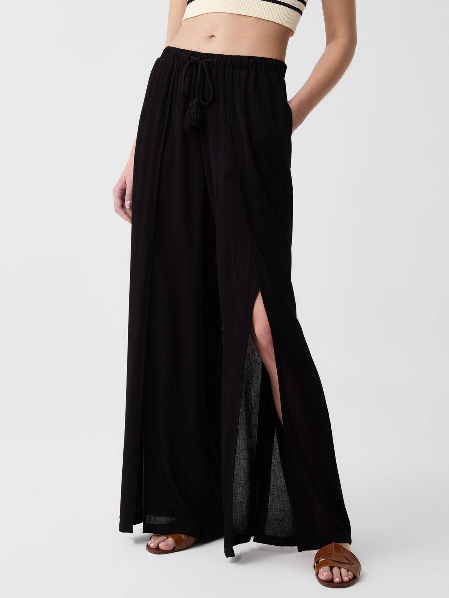 Wide-leg palazzo trousers with slits_1