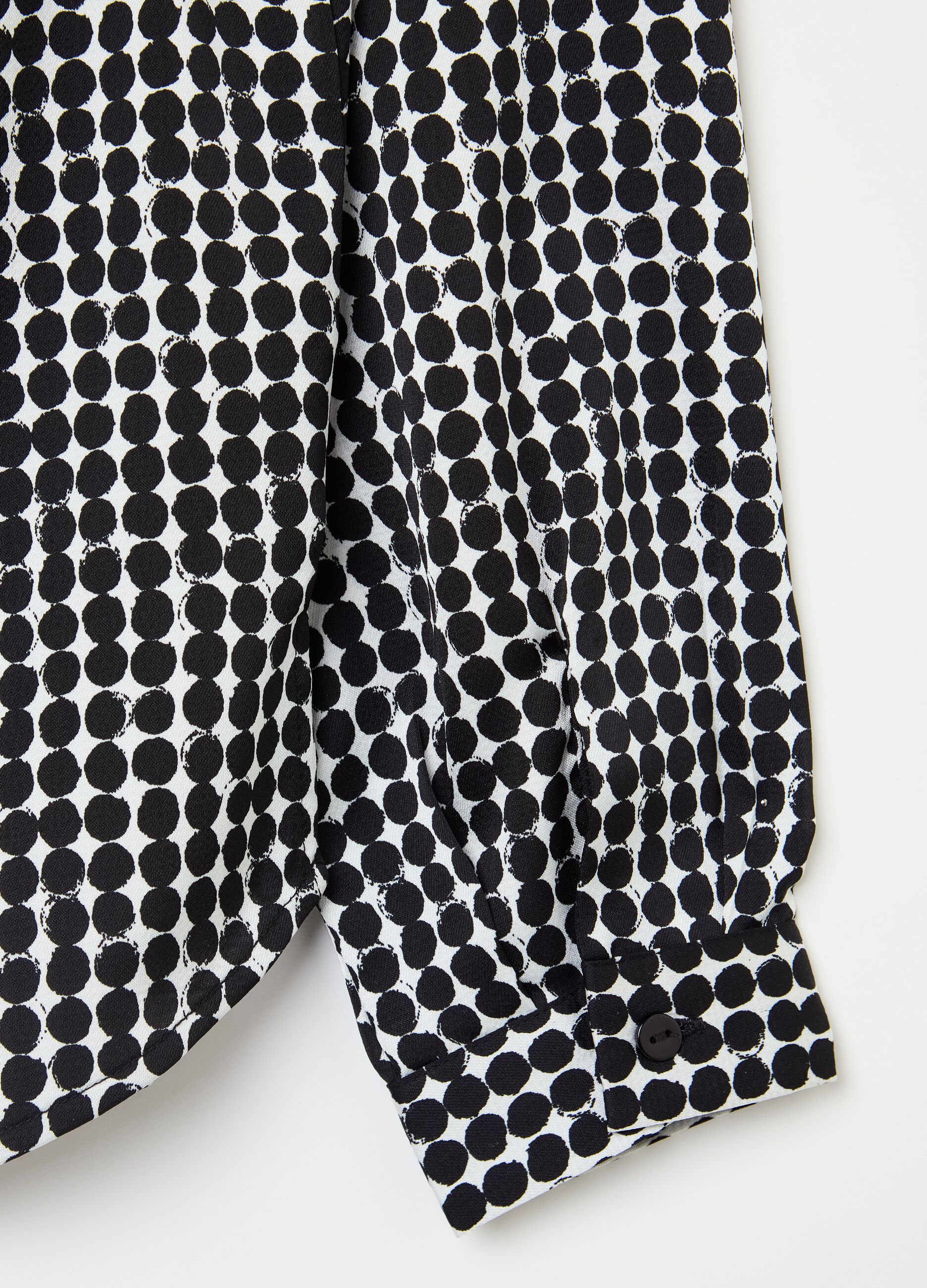 Blouse with polka dot pattern