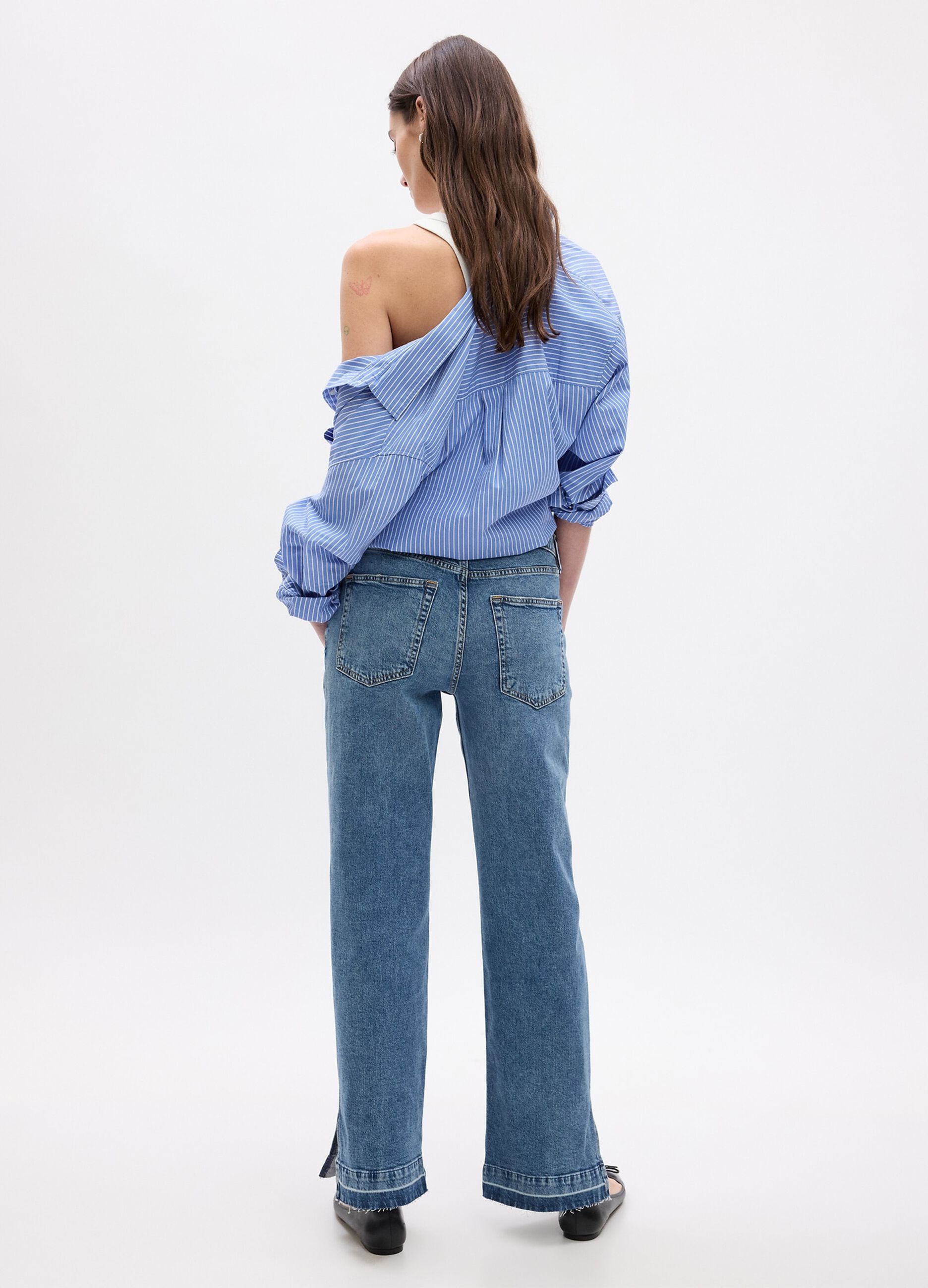 Loose-fit high-rise jeans with acid wash treatment