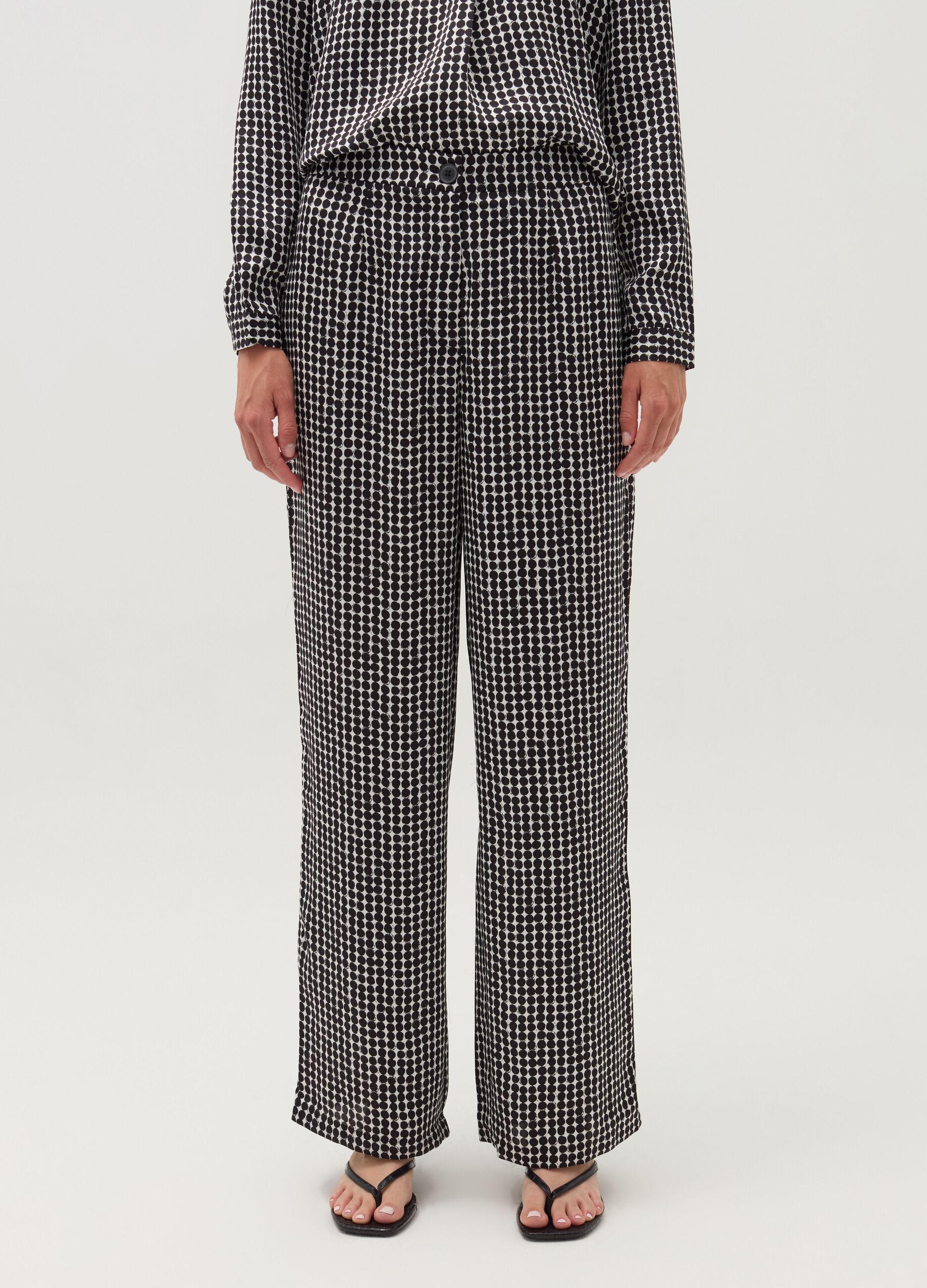 High-rise trousers with polka dot pattern