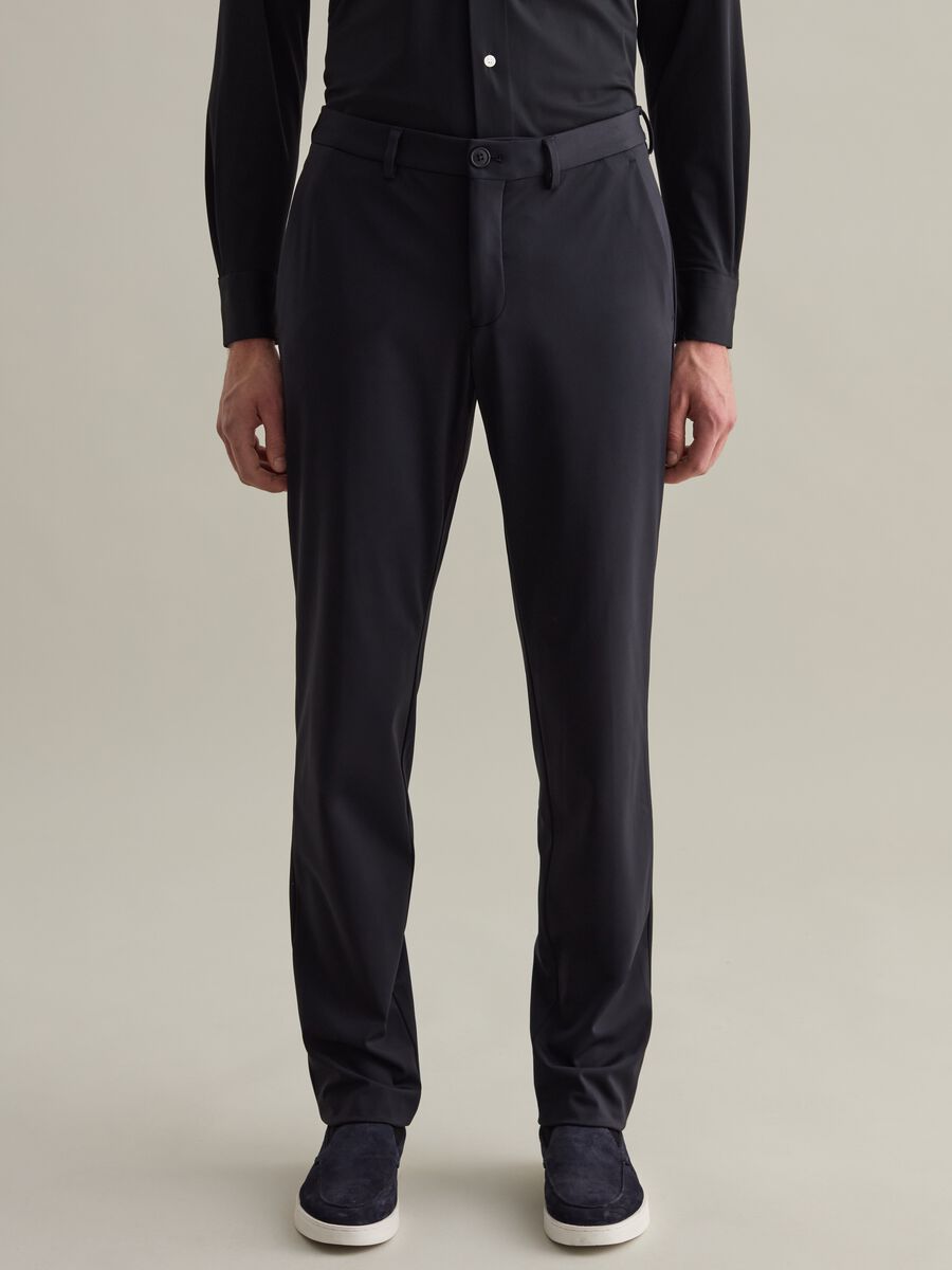 Contemporary chino trousers in technical fabric_1