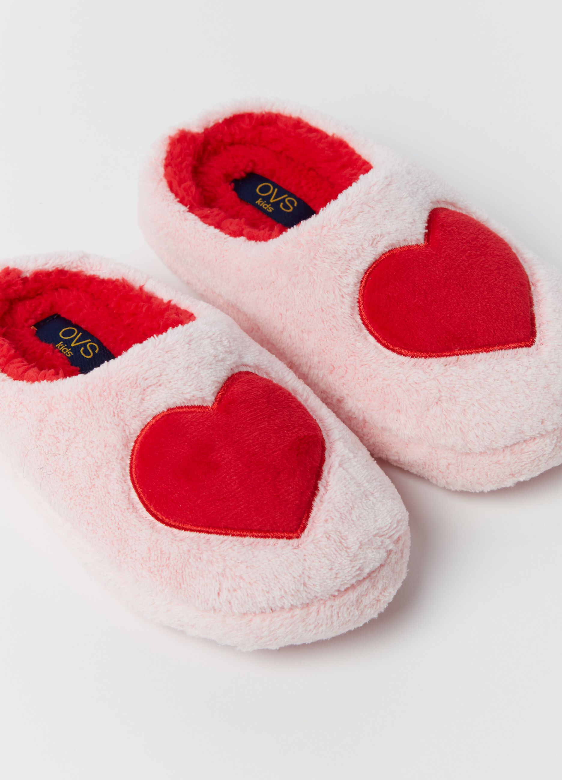 Faux fur slippers with heart embroidery