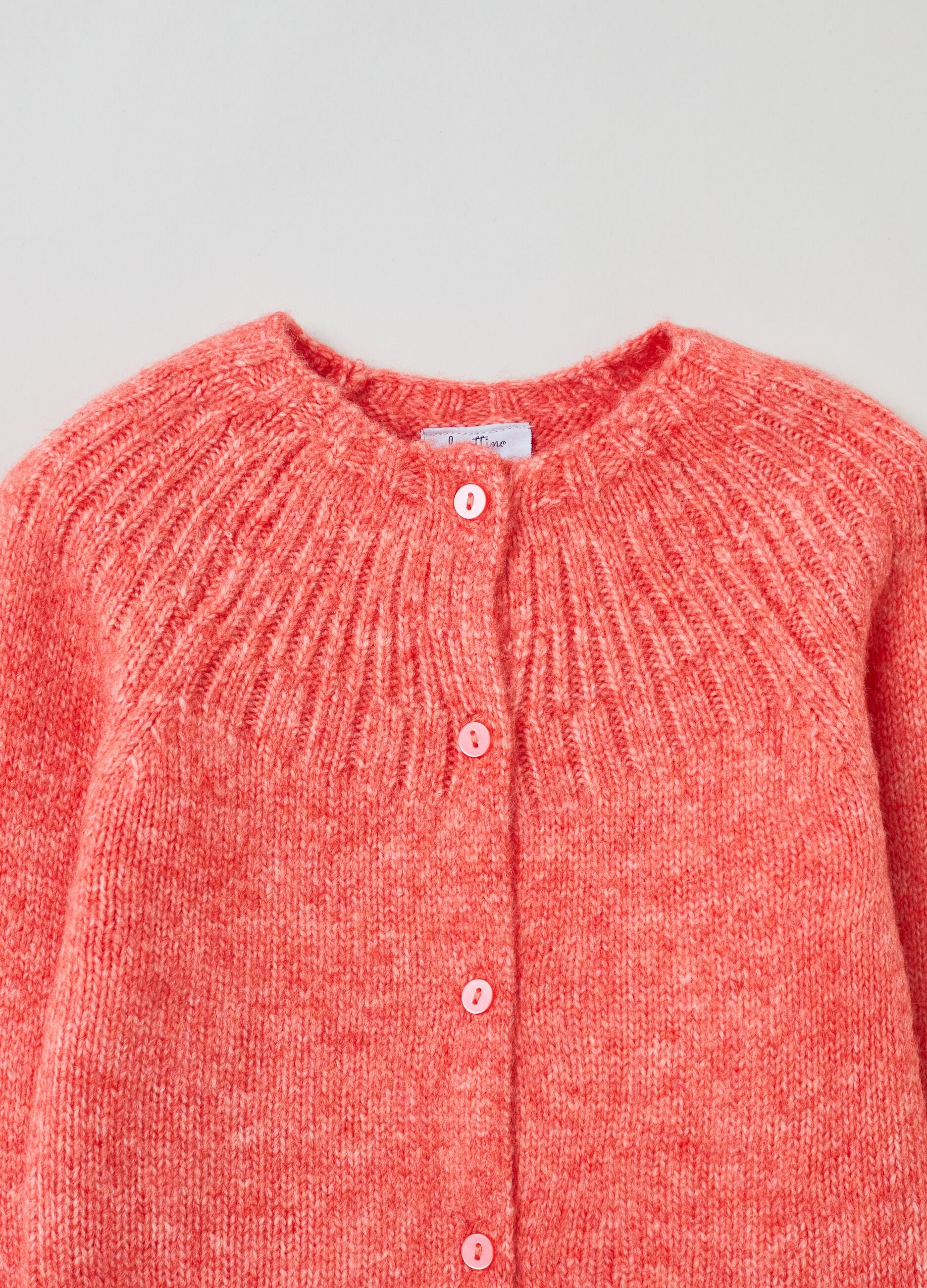 Cardigan with raised design