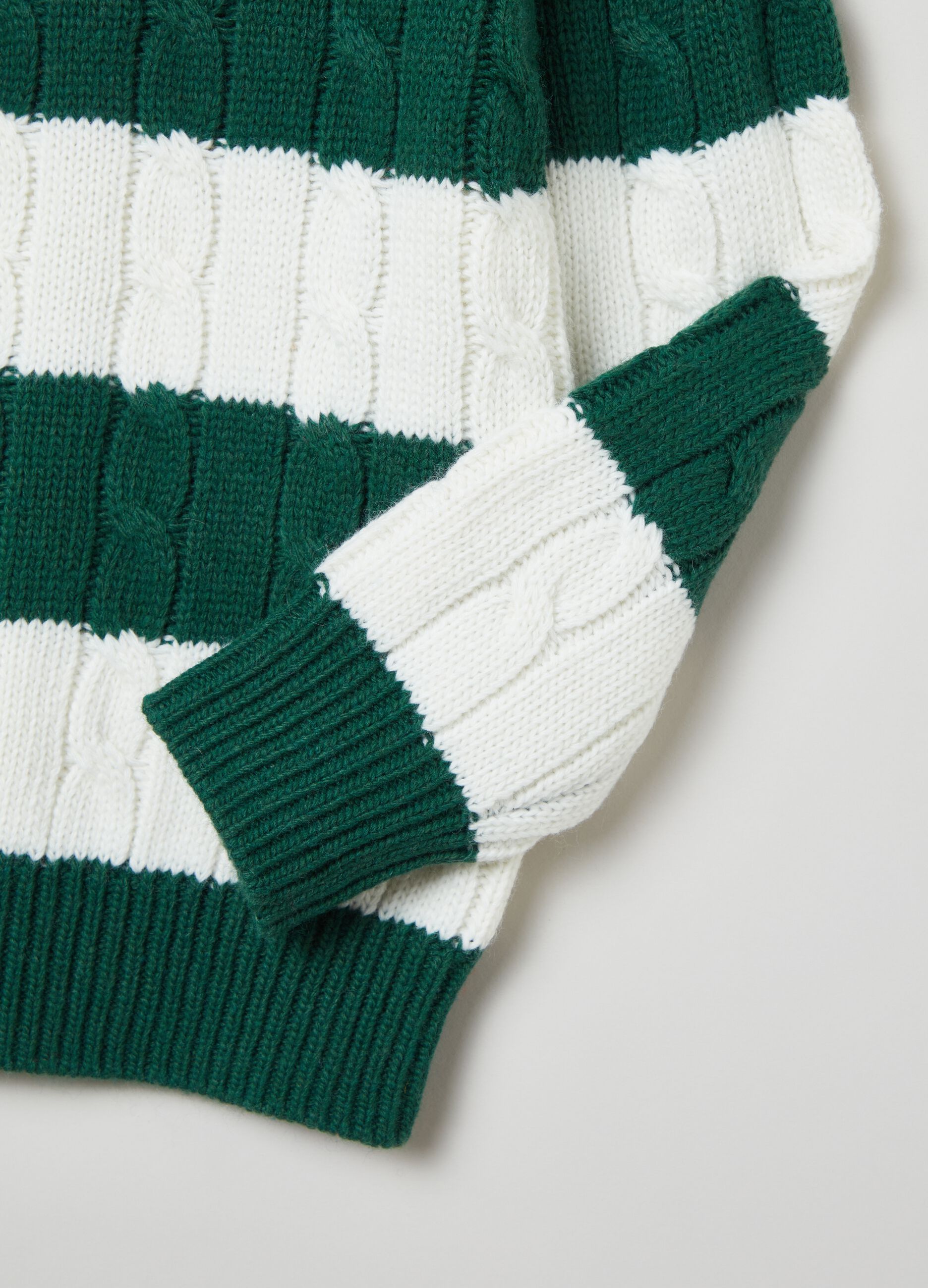 Striped pullover with cable-knit design