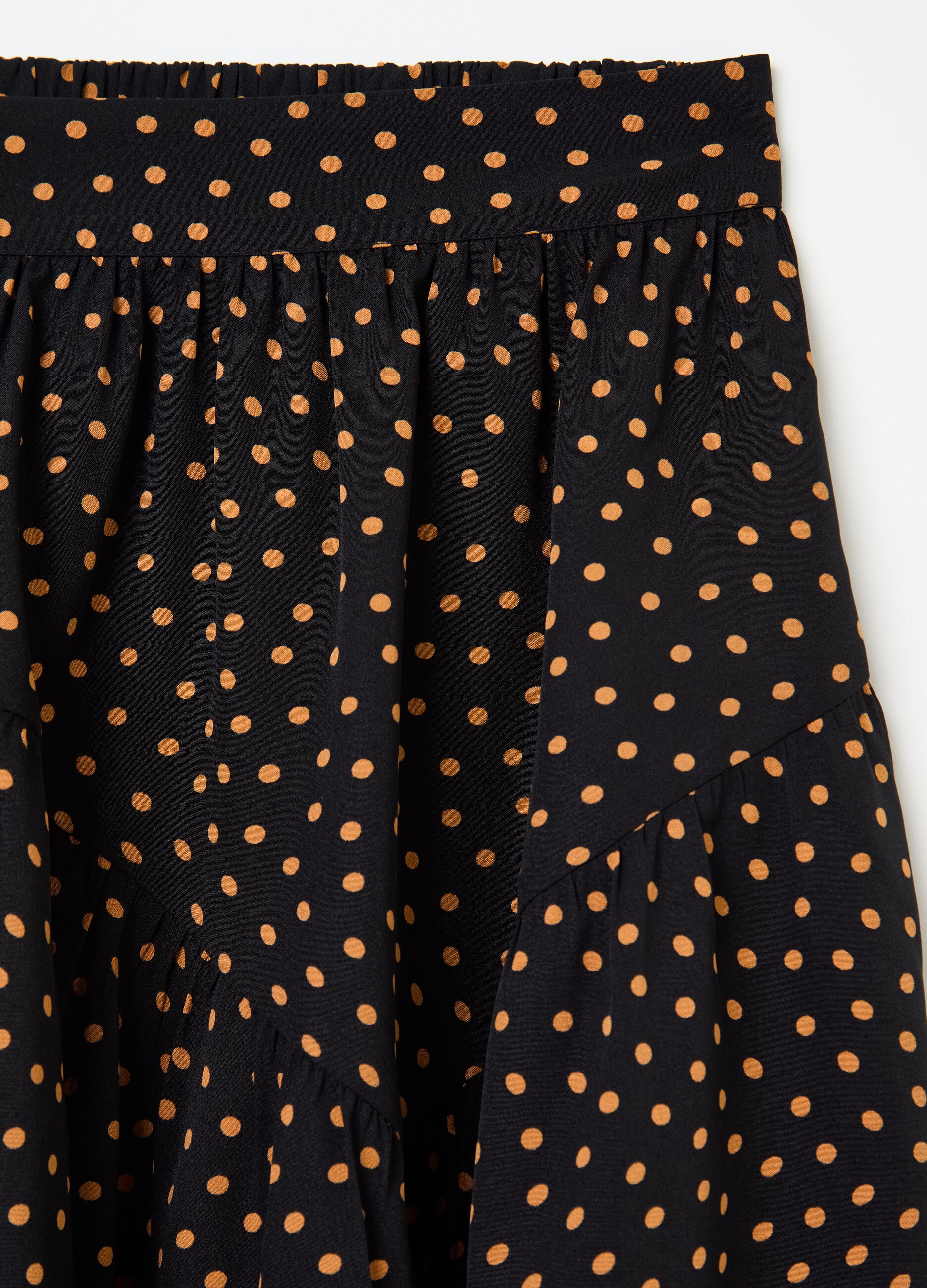 Short polka dot skirt with flounce