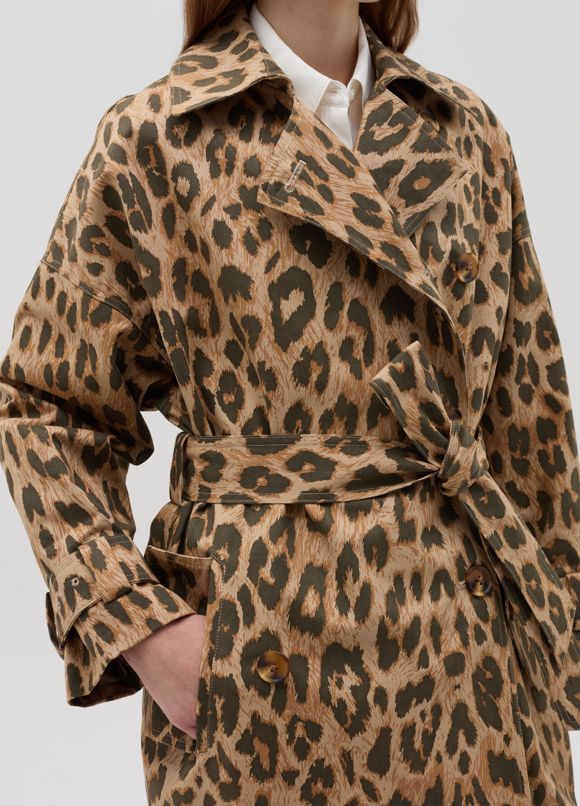 Double-breasted trench coat with animal print