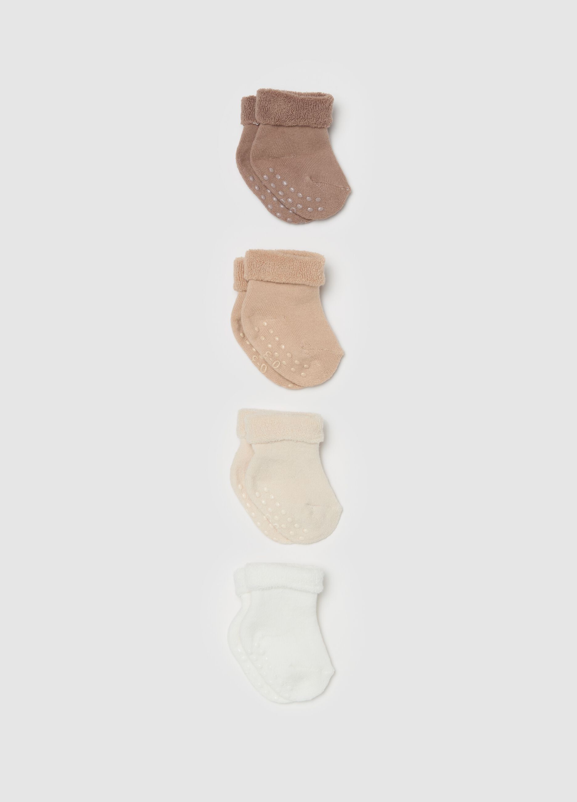 Four-pair pack socks in solid colour terry