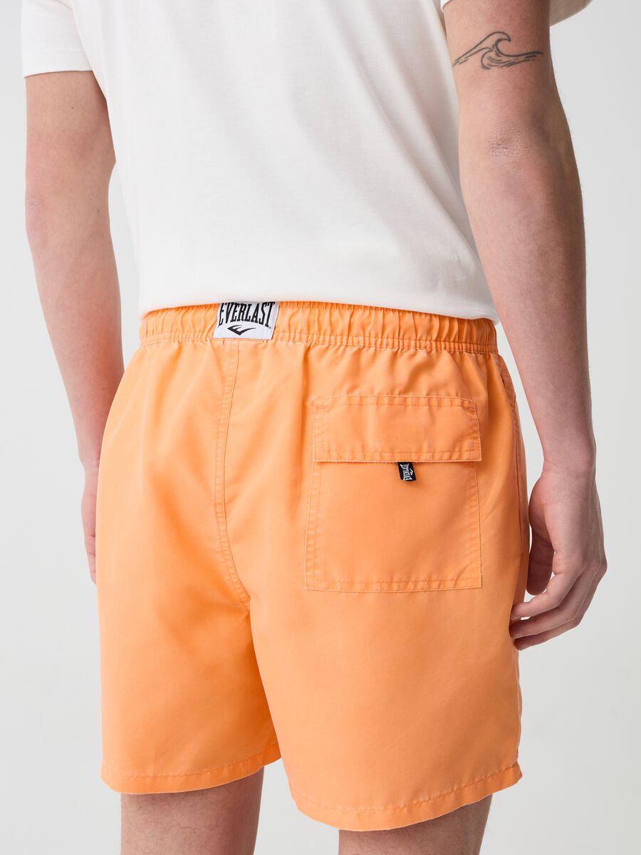 Swimming trunks with drawstring and logo print_1