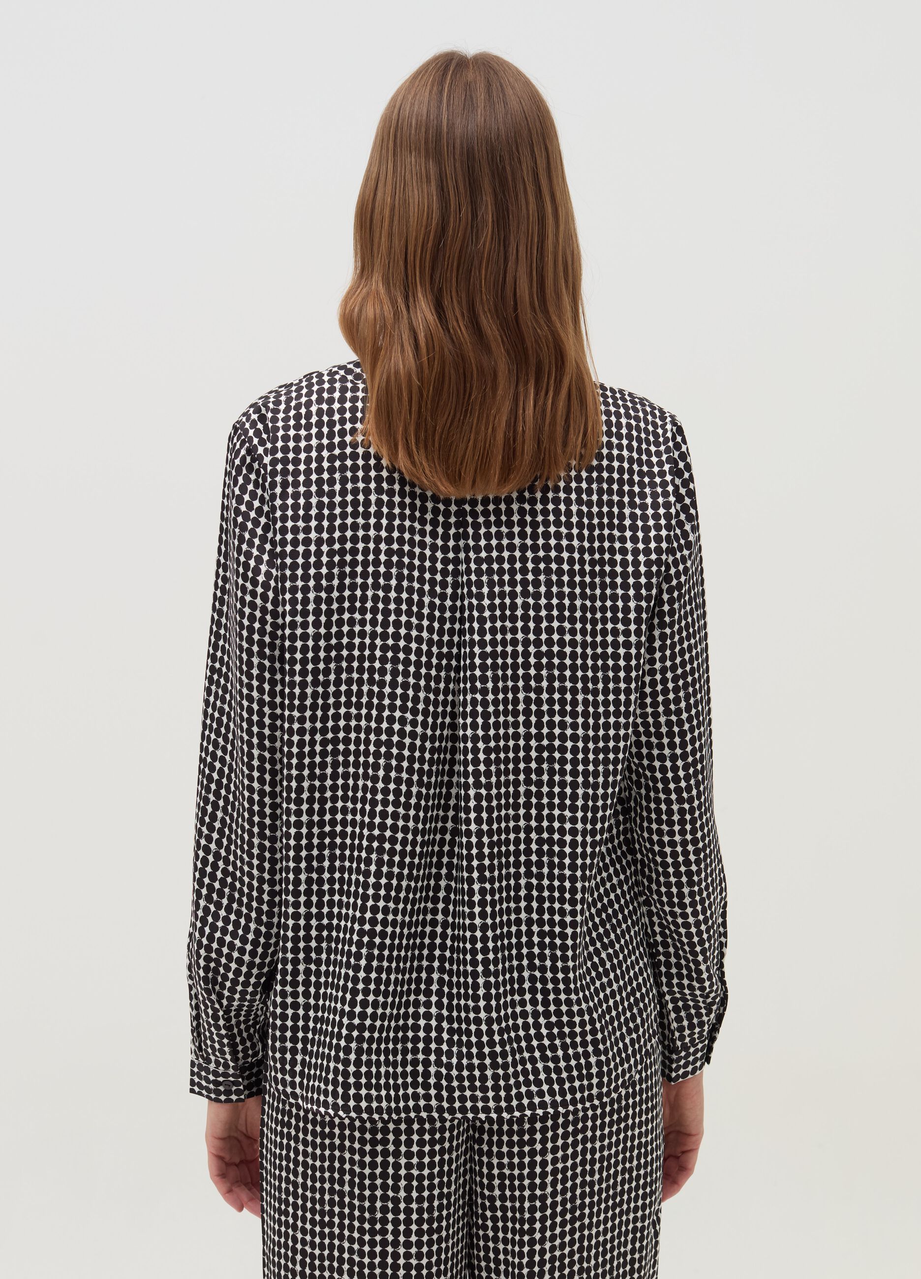 Blouse with polka dot pattern