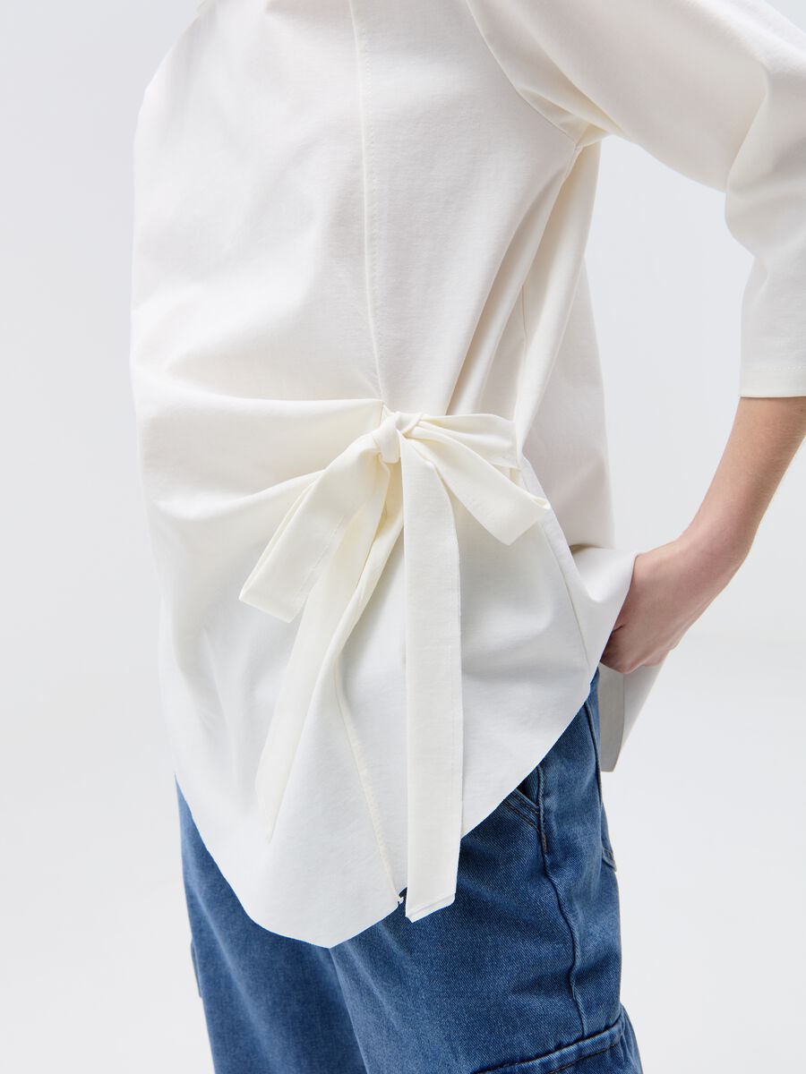Asymmetric blouse with side bow_1