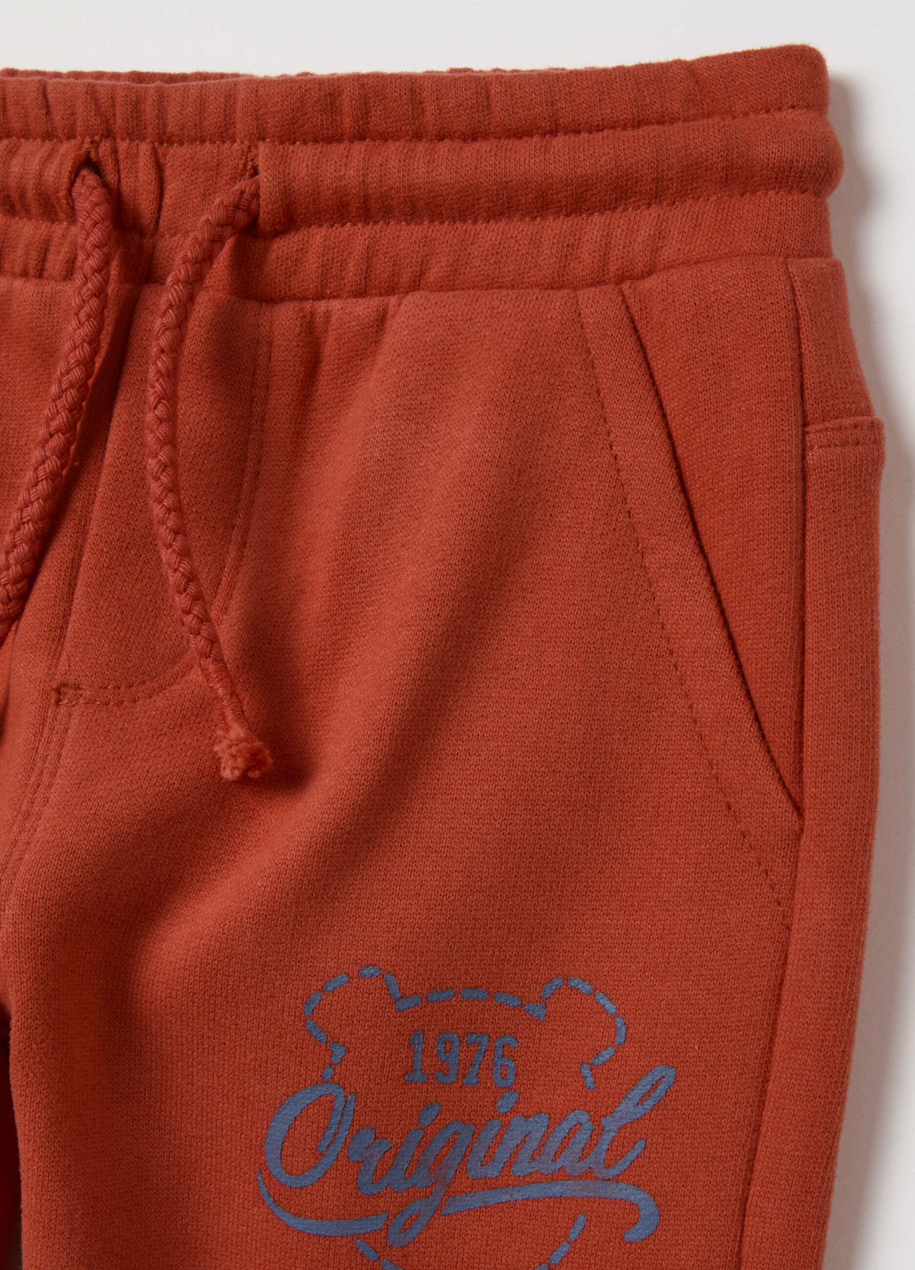 Fleece joggers with drawstring and print